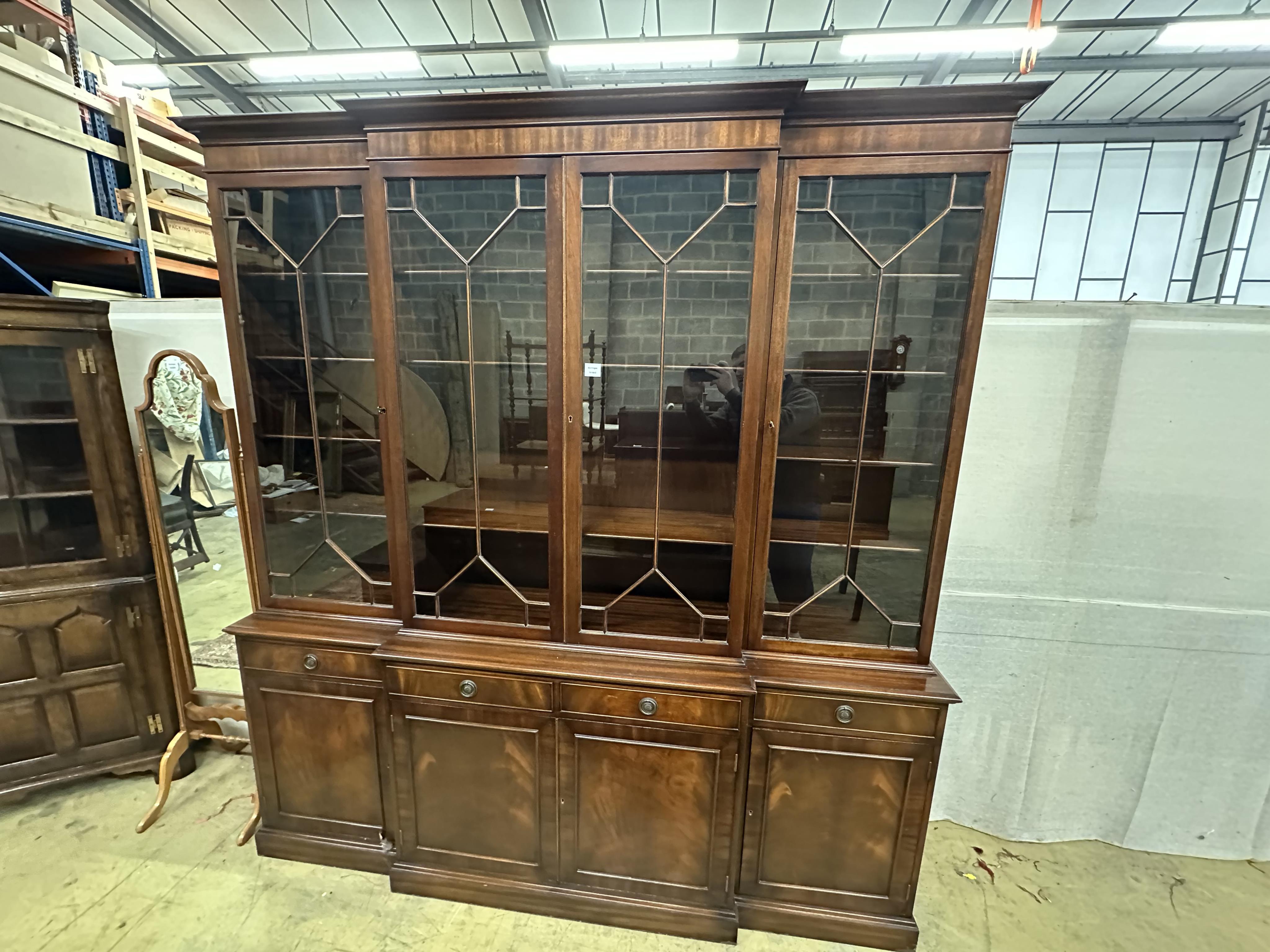 A reproduction George III style mahogany breakfront library bookcase, width 204cm, depth 48cm, height 220cm. Condition - good